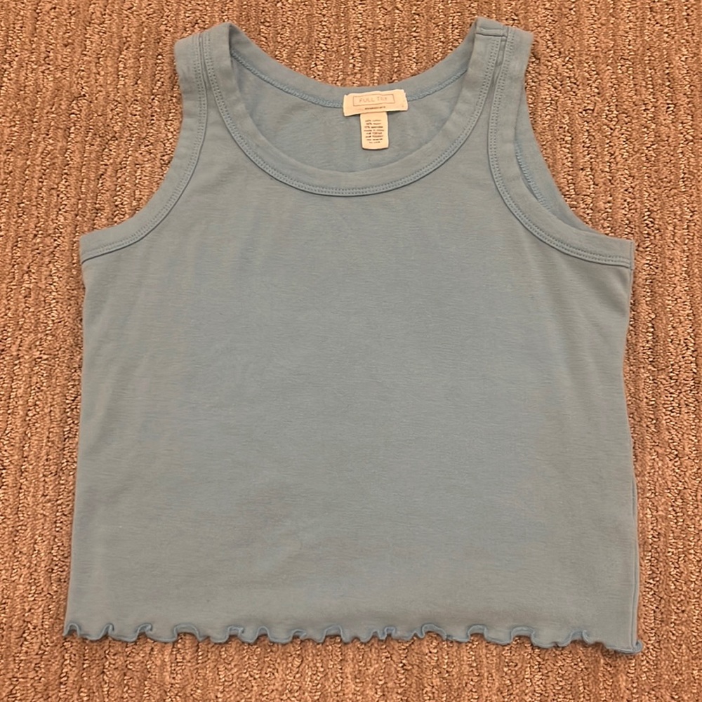 I am selling this blue tank top with ruffles on the bottom.